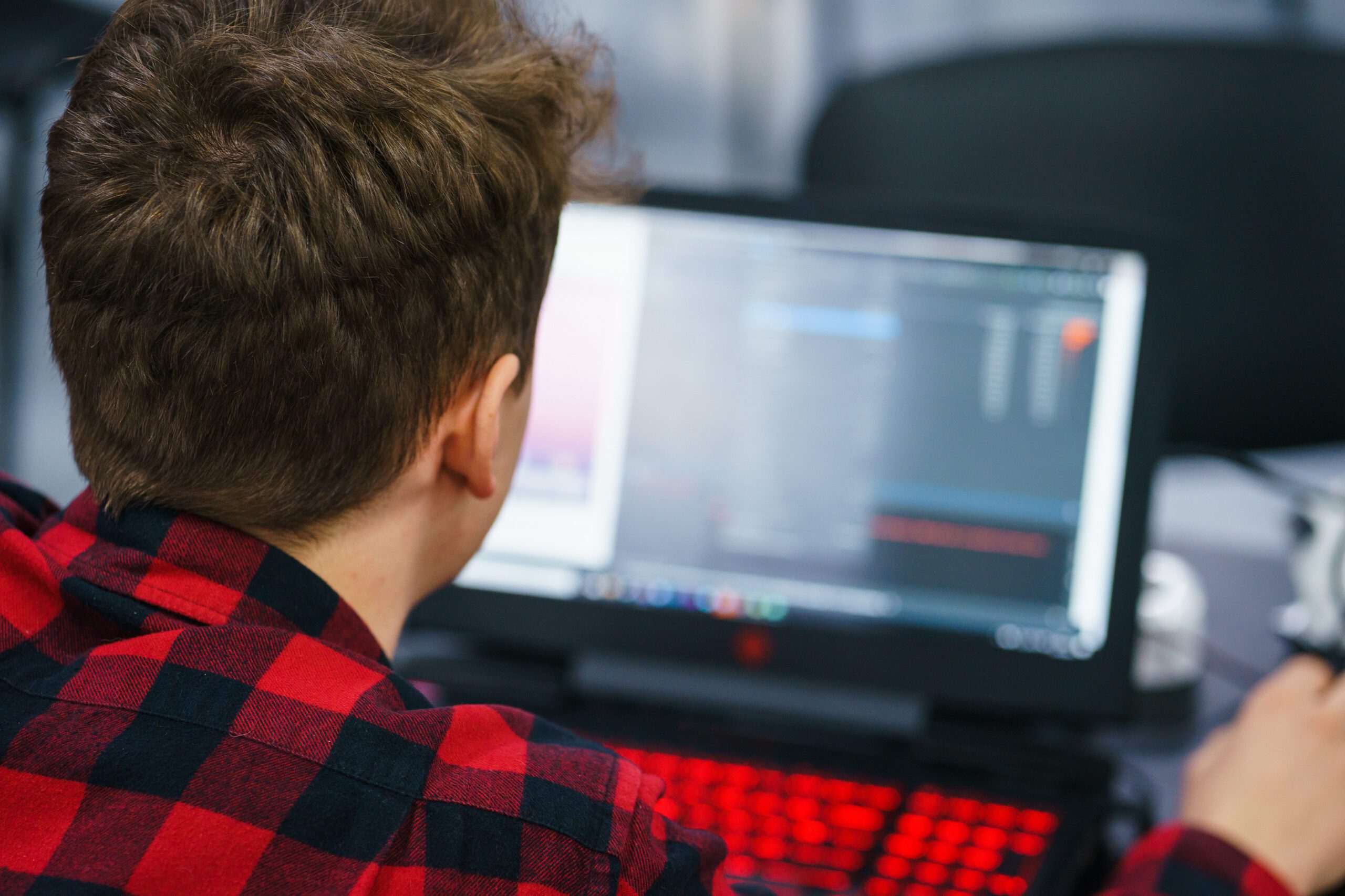Developer of program code. Process of writing code in a special application.