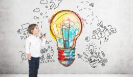 Cute little boy with a marker, business idea