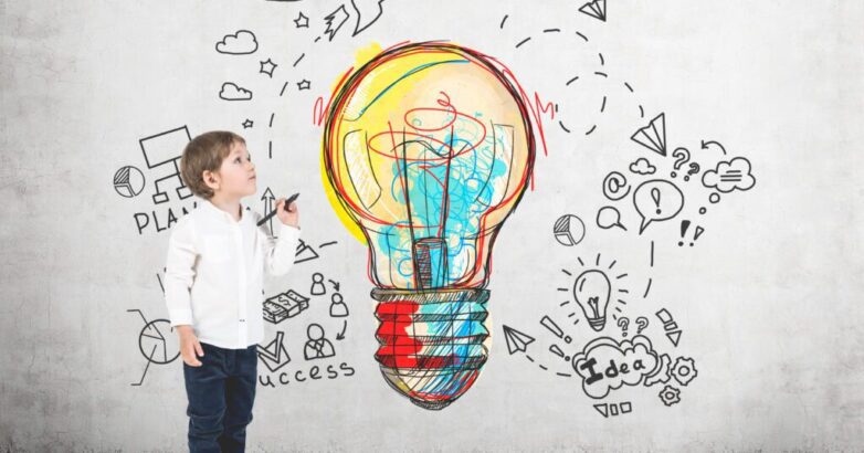 Cute little boy with a marker, business idea
