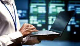 Mechanic checks servers in crypto farm