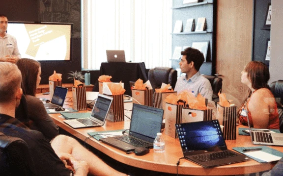 Business professionals discussing AI-Driven Business Solutions