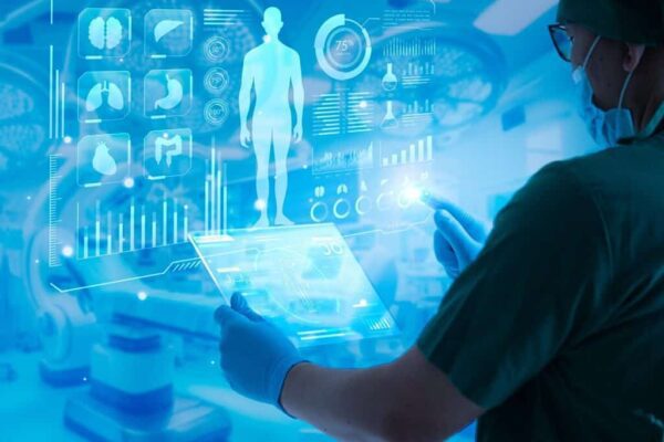 Web_Healthcare (1) Physician leveraging cloud for healthcare to deliver telemedicine and remote monitoring in lifesciences and clinical settings